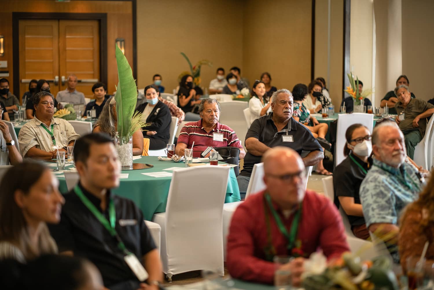 Agricultural producers and professionals listen to a presenter at the Farmer Focus Conference in June 2022 in Guam.