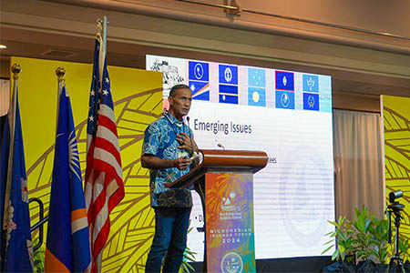 Roland Quitugua presents on invasive species at the Micronesian Islands Forum on June 4, 2024.