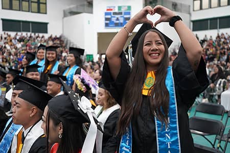 The University of Guam conferred degrees on Sunday to 217 graduates at its Fanuchånan 2024 Commencement Ceremony in the Calvo Field House. 