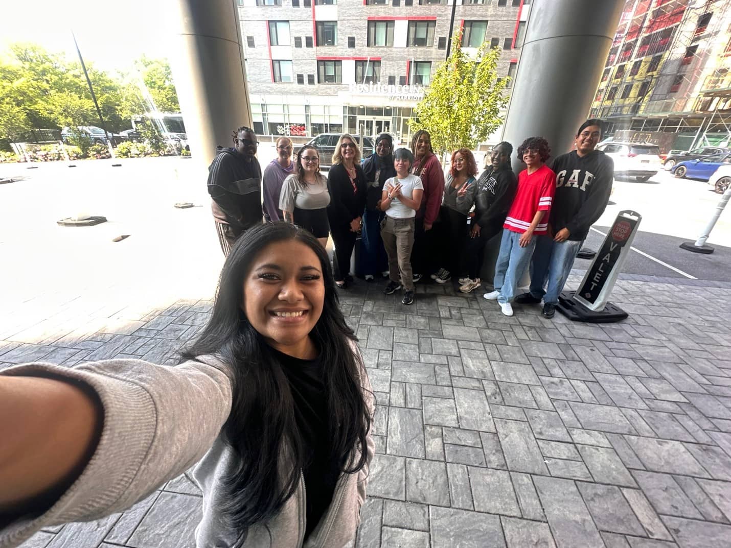 Tyra Delos Reyes takes a selfie with her fellow student leaders during pre-orientation day.