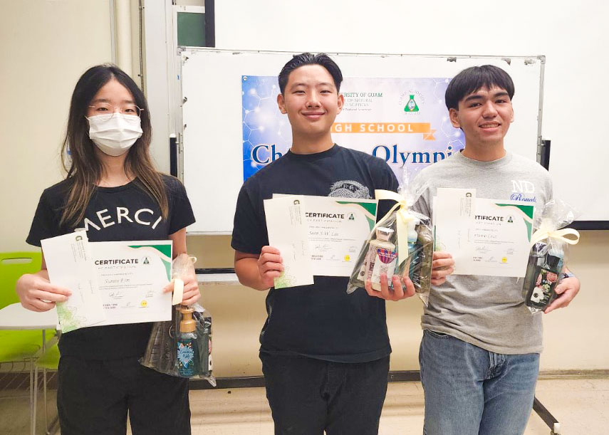 Standard Category exam winners of the 2025 UOG High School Chemistry Olympiad. (From left: Sean Lee (1st place – Saint John’s School), Sumin Kim (2nd place – Home Schooled), and Antonio Cruz (3rd place – Notre Dame High School). Photo of three winners holding certficates