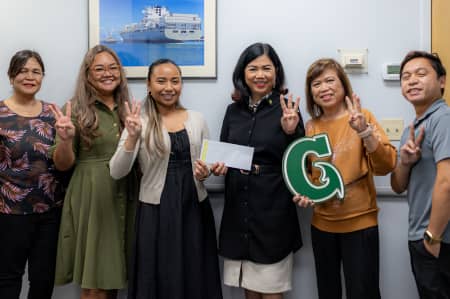 AGA Guam Chapter awards Dierking Scholarships to UOG students Abigail UY and Princess Fernandez.