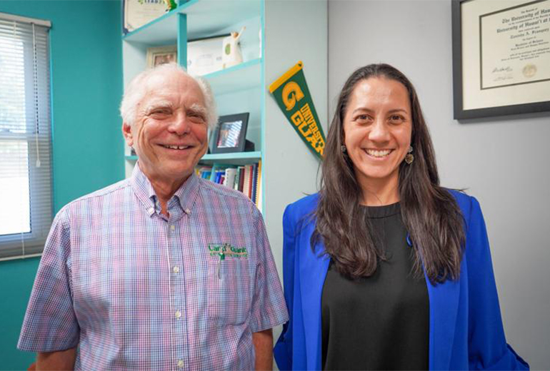 Robert Barber and Tanisha Aflague pose for a photo