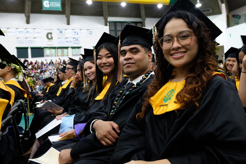 UOG graduates pose for photo
