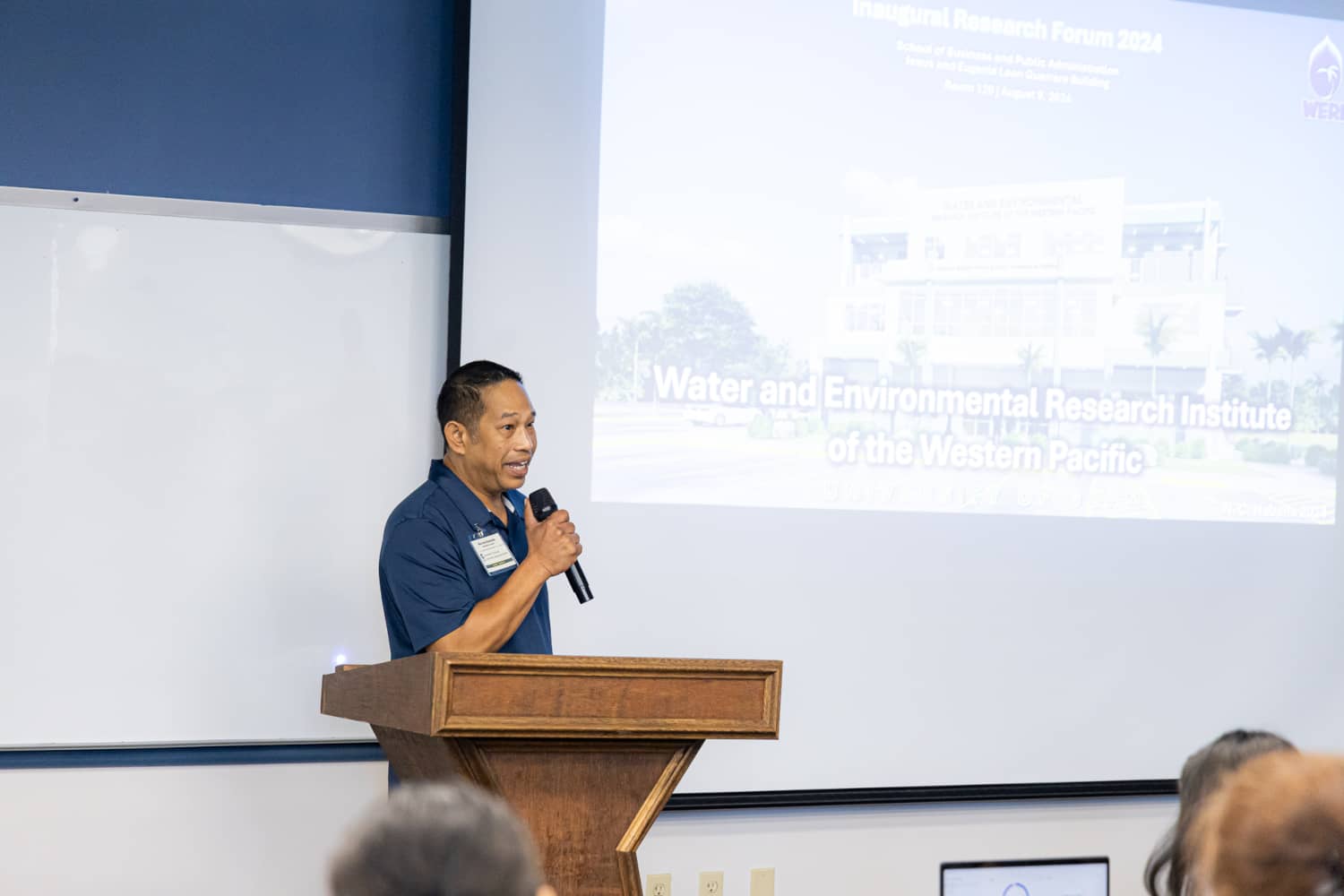 Habana: Dr. Nathan Habana of the Water & Environmental Research Institute of the Western Pacific (WERI) at the University of Guam presents during the Inaugural Research Forum held on August 9, 2024 on the Mangilao campus.